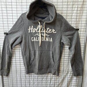 Hollister California pullover hoodie in gray with raised embroidered front logo.